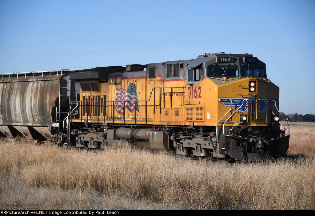 Grain train waits to head east